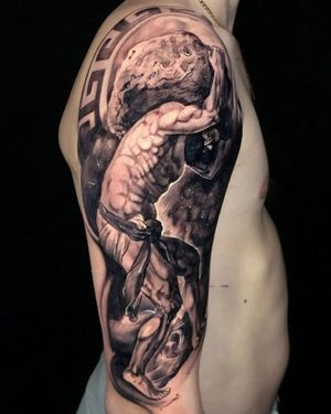 Experience the power of blackwork and realism with this striking tattoo of a rock statue by Mauro Imperatori. Truly unique and captivating.