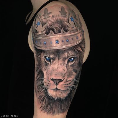 half lion half human face tattoo