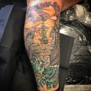 Voyage through the sea with this stunning neo-traditional ship tattoo on your lower leg by Matthew Ono.