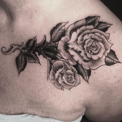 Elegant rose design by artist Matthew Ono, combining traditional and black & gray styles. Perfect for shoulder placement.