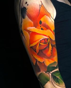 Add a pop of color to your arm with this stunning watercolor flower tattoo by Cloto.tattoos. Perfect for those who appreciate illustrative design.
