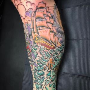 Immerse yourself in the captivating beauty of the ocean with this stunning Japanese sleeve tattoo featuring a ship, expertly crafted by artist Matthew Ono.