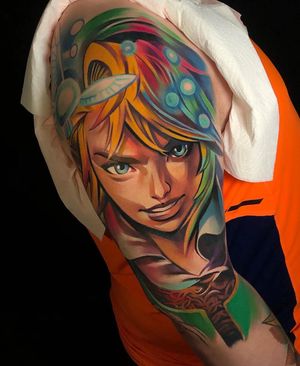 Capture the essence of adventure with this anime-style upper arm tattoo featuring a warrior with a sword, surrounded by mystical elements. By Cloto.tattoos.