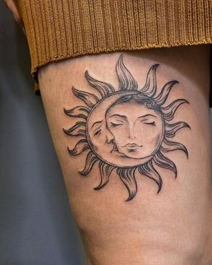 Capture the beauty of day and night with this stunning sun and moon forearm tattoo. Edyta's intricate fine line work brings harmony to your skin.