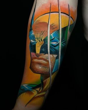 Get inked with a fierce and detailed anime-style Wolverine tattoo on your forearm by the talented artist Cloto.tattoos. Stand out with this unique illustrative design!