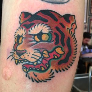 Get a fierce and traditional Japanese tiger tattoo on your forearm by the talented artist Kiko Lopes. This illustrative design will make a bold statement.