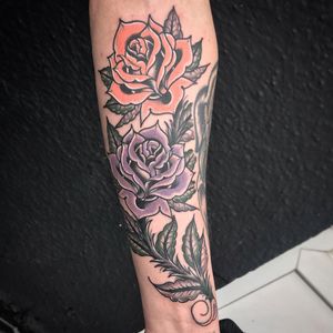Get inked by artist Matthew Ono with a vibrant traditional rose design on your forearm. Make a bold statement with this classic motif.