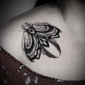 Unique blackwork, dotwork, fine line design by Lamat showcasing the beauty of butterflies and moths on your chest.