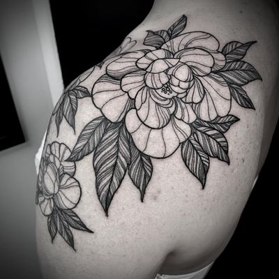 Delicate fine line floral design featuring beautiful peonies and plants on the shoulder. Created by the talented artist Lamat.
