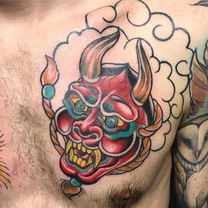 Immerse yourself in the mystique of Japanese culture with this stunning hannya chest tattoo expertly done by Matthew Ono.