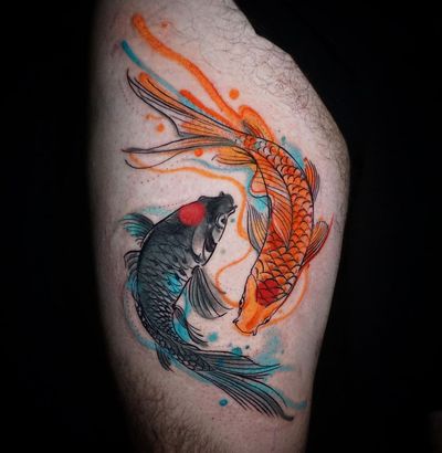 Beautiful koi fish tattoo in vibrant watercolor style, expertly done by Aygul on the upper leg
