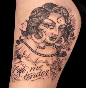 Get inspired with this chicano style upper arm tattoo featuring a powerful woman and meaningful quote by Letitia Mortimer.