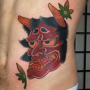 Get a stunning hannya tattoo on your ribs by the talented artist Kiko Lopes. Bold and illustrative style.