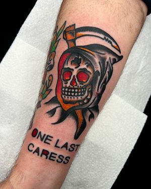 Embrace the power of death with this striking traditional skull tattoo on your forearm by Alessandro Lanzafame.