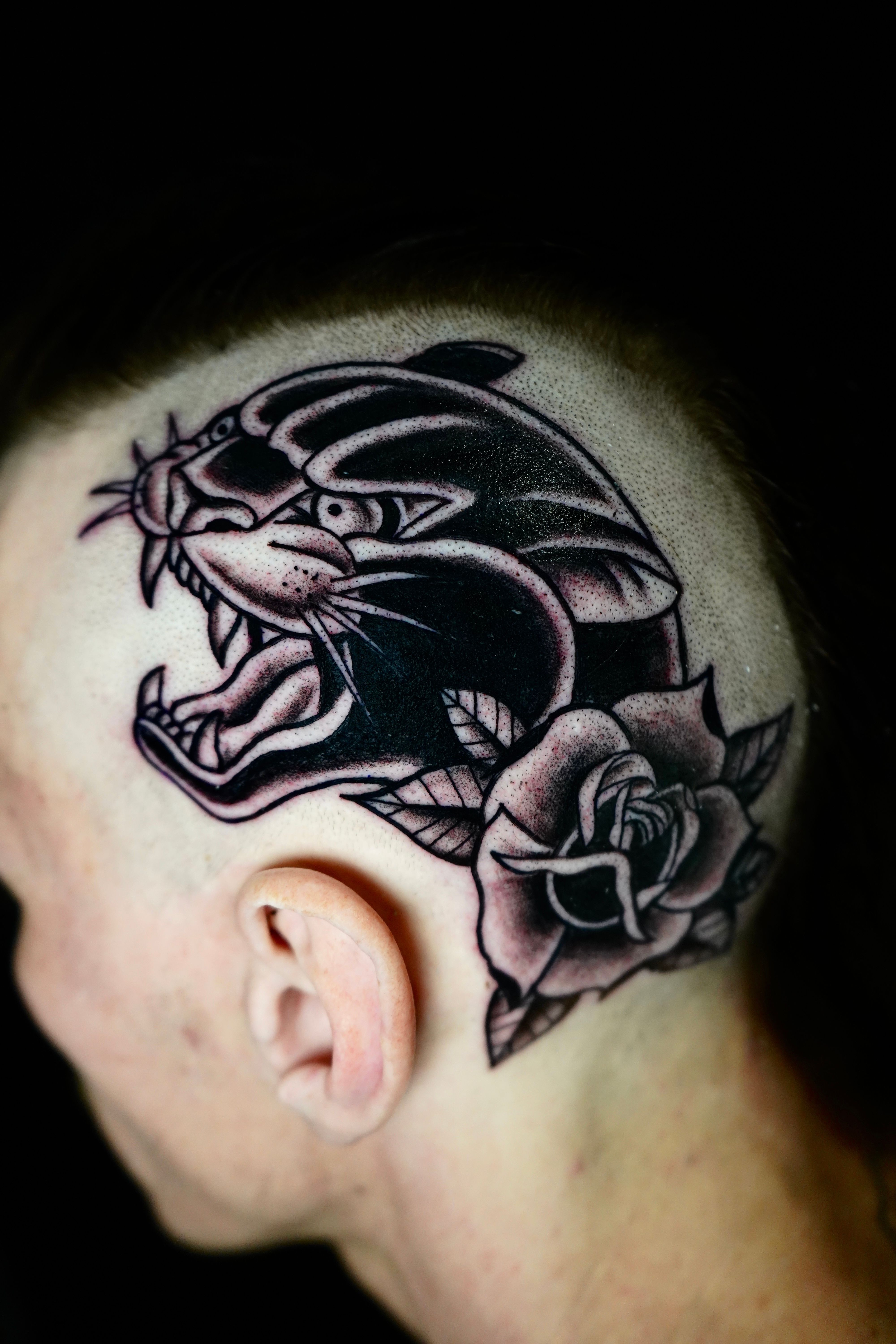 Panther & Flower Side Face Tattoo • Tattoodo
