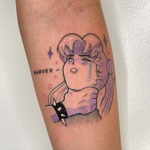 Small anime-style tattoo on forearm by Galen Bryce featuring a girl with spikes and a BDSM quote.