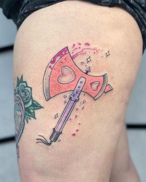 Discover the powerful combination of an axe and blood in this striking upper leg tattoo by Galen Bryce (aka Drip Skull).