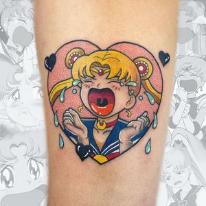Illustrative forearm tattoo by Drip Skull featuring a heartbroken anime girl with tears and a collar design.