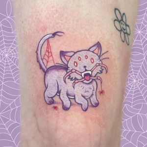 Illustrative tattoo by Galen Bryce featuring a cat, spider, and web design on the forearm. Also known as Drip Skull.