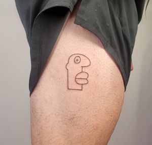 Capture the essence of masculinity with a fine line man tattoo on your upper leg. Designed by Jonathan Glick.