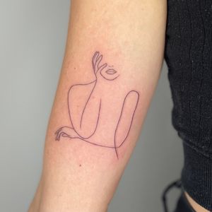 Fineline tattoo of a woman