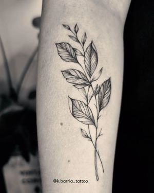 Adorn your forearm with a delicate floral leaf design, expertly inked in fine line style by the talented artist Katia Barria.