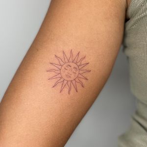 Fineline sun tattoo