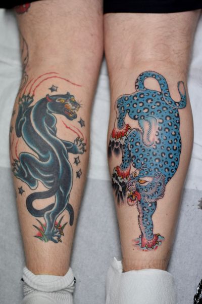 Traditional Japanese style tattoo of a fierce panther or jaguar done by the talented artist Adam Ruff.