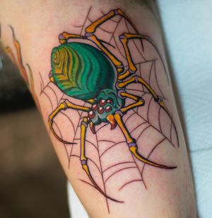 Unique neo-traditional spider design by artist Adam Ruff, perfect for a forearm placement.
