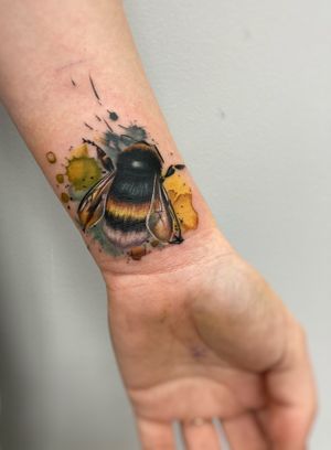 Watercolour bee tattoo