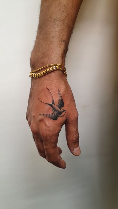 swallow tattoos on wrist