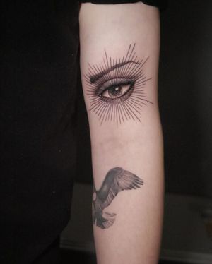 Get mesmerized by this black and gray micro-realism tattoo on your upper arm. Created by the talented artist Alexander Rufio.