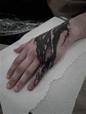 Elegant blackwork pattern tattoo on hand by the talented artist Rachel Aspe at Bellatrix Tattoo.