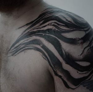 Get a stunning blackwork pattern tattoo on your shoulder by Rachel Aspe at Bellatrix Tattoo.