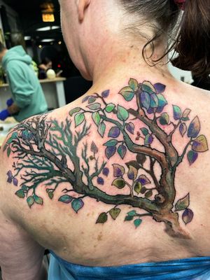 Gifford Kasen's stunning illustrative tree design beautifully adorns the back, creating a timeless and nature-inspired masterpiece.