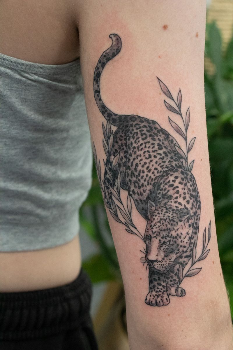 Tattoo uploaded by Gifford Kasen • leopard and floral • Tattoodo