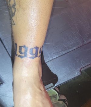 1999 ankle tattoo