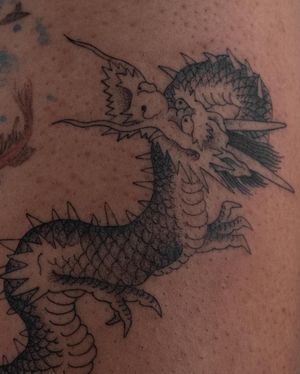 Get a stunning black and gray illustrative dragon tattoo by FKM TATTOO on your back for a truly unique and badass look!