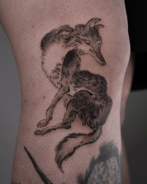 Capture the mystique of the fox with this intricate black and gray design by FKM TATTOO, perfectly placed on the knee.