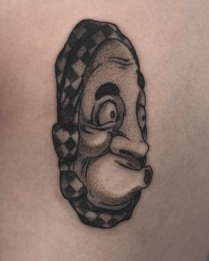 Unique blackwork and dotwork design of a man's nose, beautifully executed by FKM TATTOO on the arm