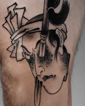 A striking Japanese style tattoo featuring a man with a sword, dagger, and namakubi on the upper leg. Created by FKM TATTOO.