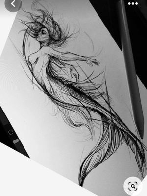 Love the lines of this mermaid tattoo 