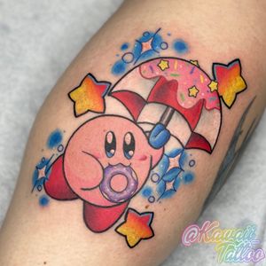 Kawaii Kirby with donut and umbrella tattoo by Alexis Haskett
