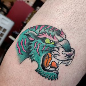 Experience the fierce beauty of a neo traditional tiger tattoo by the talented artist Mary Shalla. Bold lines and vibrant colors bring this majestic creature to life.