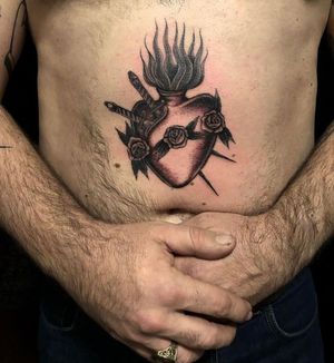 Unique blackwork design of sacred heart by Matty Magee, blending tradition with modern style.