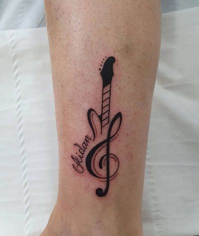 Memorial tattoo fineline music note, guitar and script