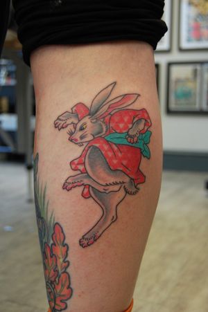 Get inked with a stunning Japanese rabbit design on your lower leg by the talented artist Bananajims.