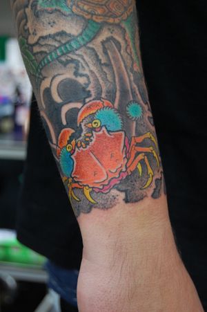 Get inked with a stunning neo-traditional crab design by Bananajims on your forearm. Stand out with this unique and artistic tattoo!