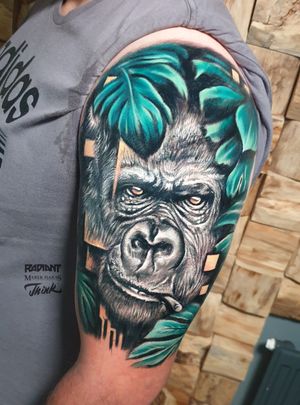 Immerse yourself in the wild world with this stunning new school gorilla tattoo by Marek Unfamous Haras. Bring the jungle to your skin!