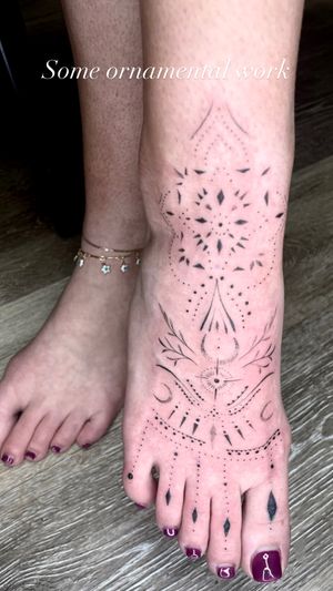 Ornamental foot tattoo